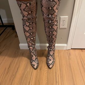 Beautiful snake skin over the knee boots! Worn a handful of times.